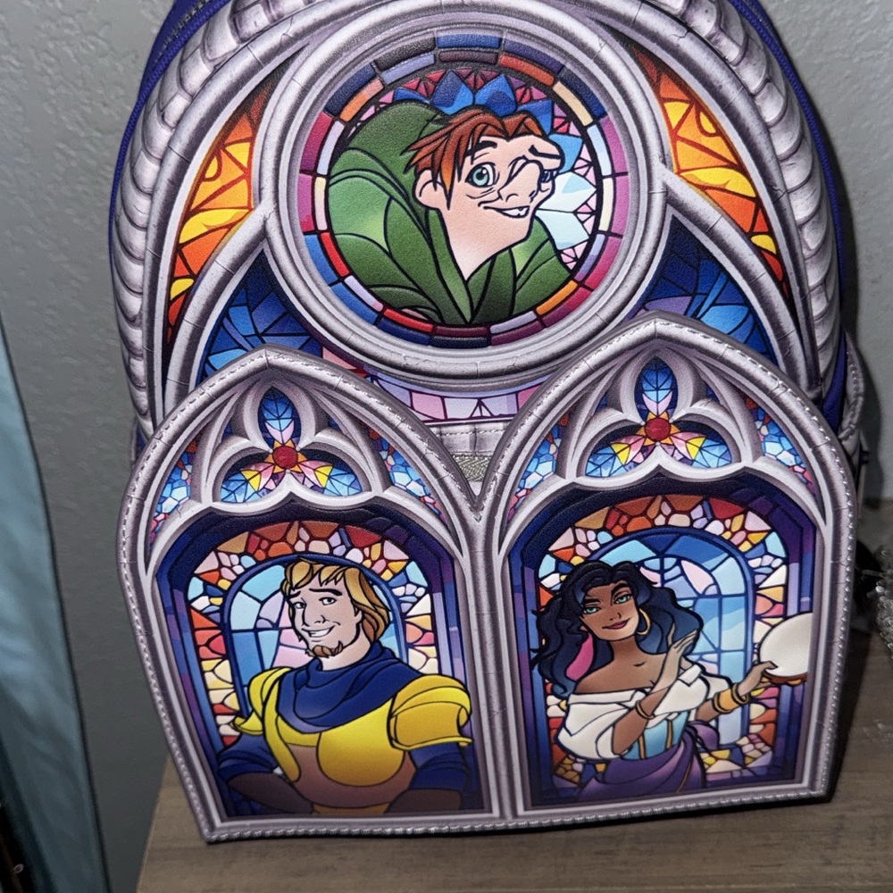 Loungefly Hunchback of Notre Dame Stained Glass Backpack in Purple, Blue, Yellow